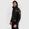 Man wearing Venum x UFC Fusion Authentic Fight Night Men's Walkout Hoodie