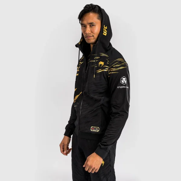 Man wearing Venum x UFC Fusion Authentic Fight Night Men's Walkout Hoodie