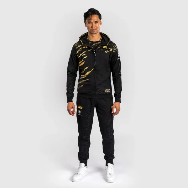 Man wearing Venum x UFC Fusion Authentic Fight Night Men's Walkout Hoodie