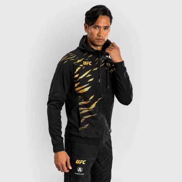 Man wearing Venum x UFC Fusion Authentic Fight Night Men's Walkout Hoodie