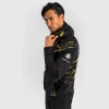 Man wearing Venum x UFC Fusion Authentic Fight Night Men's Walkout Hoodie