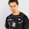 Man wearing Venum x UFC Fusion Authentic Fight Night Men's Walkout Jersey