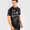 Man wearing Venum x UFC Fusion Authentic Fight Night Men's Walkout Jersey
