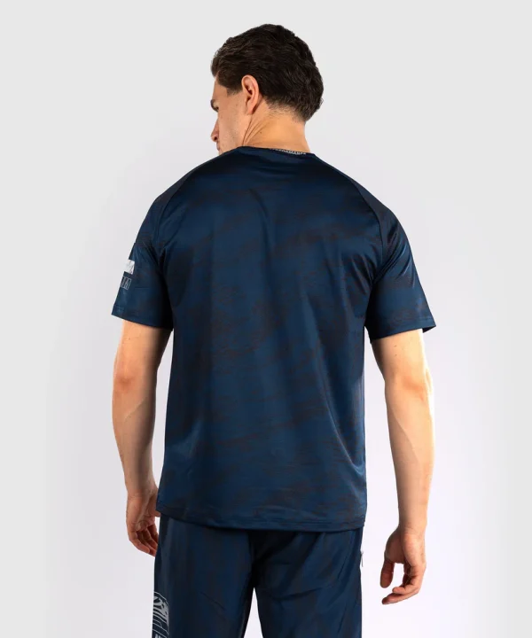 Venum x UFC Fusion Fight Week Men's Dry-Tech T-Shirt in action