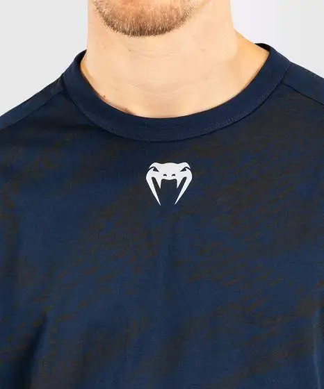 Man wearing a long-sleeve Venum x UFC Fusion Fight Week t-shirt