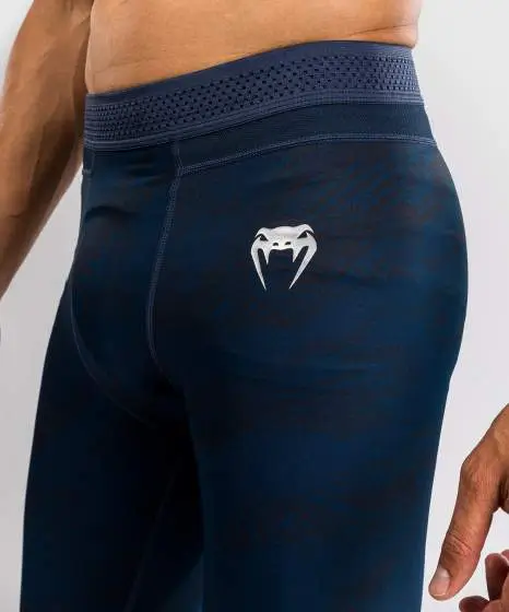 Man wearing Venum x UFC Fusion Fight Week Men's Performance Tights Spats