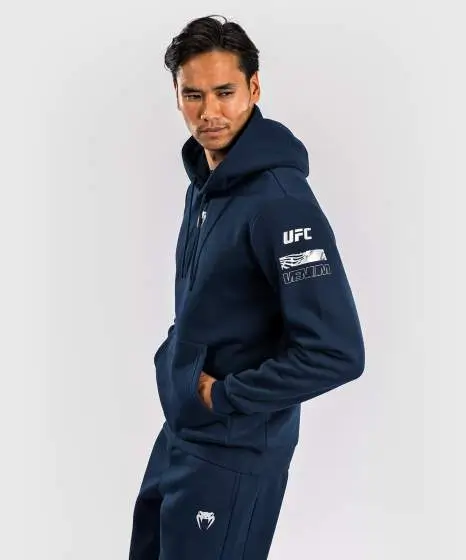 Man wearing Venum x UFC Fusion Fight Week Men's Pullover Hoodie.