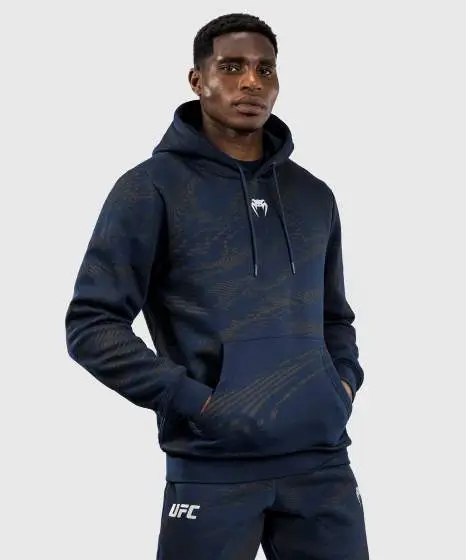 Man wearing Venum x UFC Fusion Fight Week Men’s Pullover Hoodie