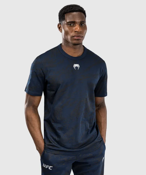 Man modeling the Venum x UFC Fusion Fight Week Men's Short Sleeve T-Shirt.