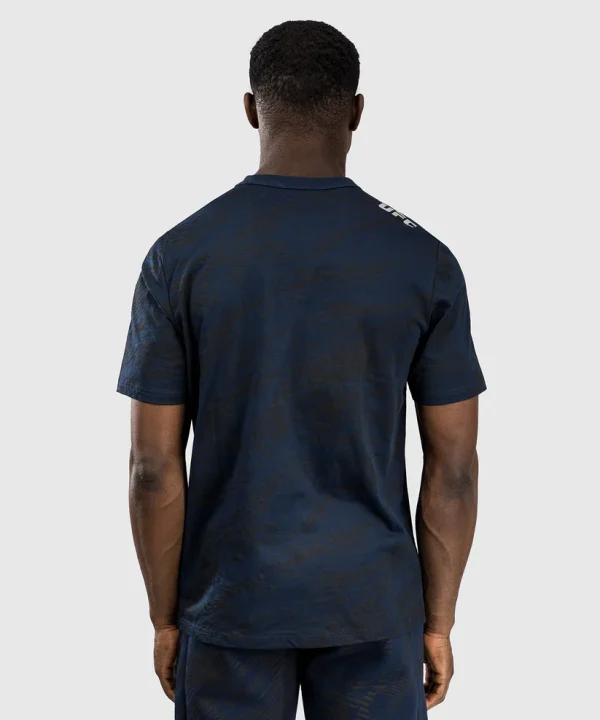 Man modeling the Venum x UFC Fusion Fight Week Men's Short Sleeve T-Shirt