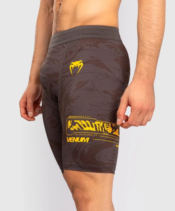 Man wearing Venum x UFC Fusion Fight Week Men’s Vale Tudo Compression Shorts
