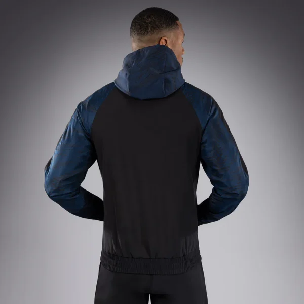 Venum X Ufc Fusion Fight Week Mens Zip Hoodie Blue 6 Man modelling a Venum x UFC Fusion Fight Week Men's Zip Hoodie