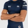 Man wearing Venum x UFC Fusion Men's Fight Week Performance Short Sleeve Rashguard