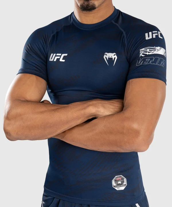 Man wearing Venum x UFC Fusion Men's Fight Week Performance Short Sleeve Rashguard