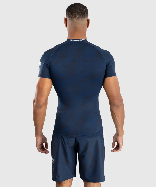 Venum x UFC Fusion Men's Fight Week Performance Short Sleeve Rashguard in action.