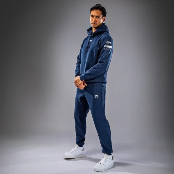 Venum X Ufc Fusion Mens Fight Week Pullover Solid Hoodie Blue 4 Man wearing a Venum x UFC Fusion Men's Fight Week Pullover Solid Hoodie