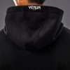 Man wearing Venum x UFC Fusion Men's Replica Zip Hoodie
