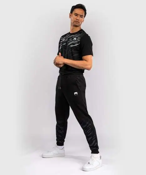 Man wearing Venum x UFC Fusion Replica Men's Jogger Pants