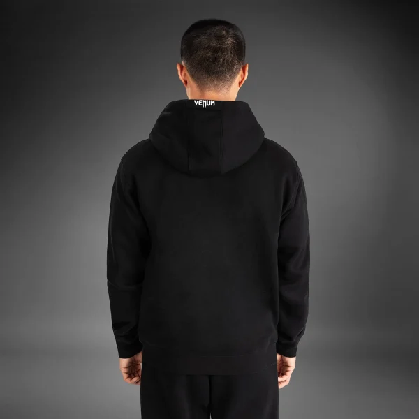 Venum X Ufc Fusion Replica Mens Pullover Hoodie Black 2 Man modeling a Venum x UFC Fusion Replica Men's Pullover Hoodie