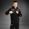 Venum X Ufc Fusion Replica Mens Pullover Hoodie Black 4 A man wearing a Venum x UFC Fusion Replica Men's Pullover Hoodie