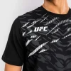 Man wearing a Venum x UFC Fusion Replica Men's Short Sleeve T-Shirt