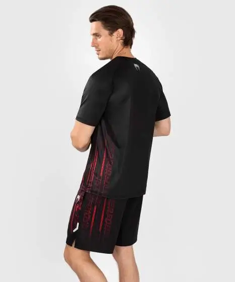 Man wearing Venum x UFC Performance Institute 2.0 Men's Dry-Tech T-Shirt