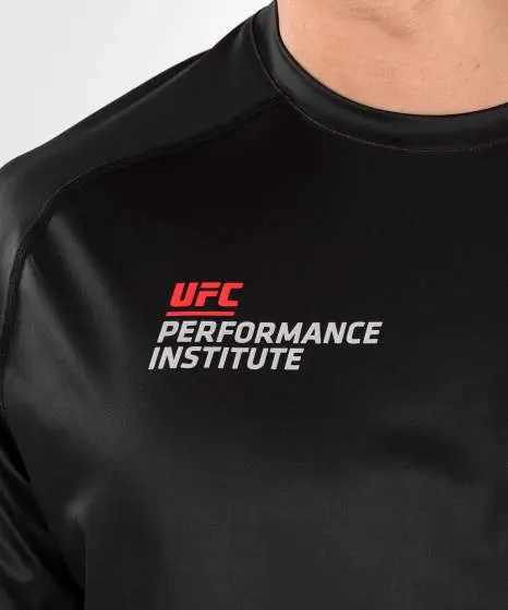 Man modeling Venum x UFC Performance Institute 2.0 Men's Dry-Tech T-Shirt