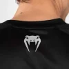 Man wearing Venum x UFC Performance Institute 2.0 Men's Dry-Tech T-Shirt