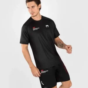 Man wearing Venum x UFC Performance Institute 2.0 Men's Dry-Tech T-Shirt
