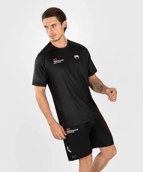 Man wearing Venum x UFC Performance Institute 2.0 Men's Dry-Tech T-Shirt