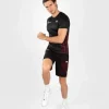 Man wearing Venum x UFC Performance Institute 2.0 Men's Short Sleeve Rashguard