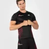 Man wearing the Venum x UFC Performance Institute 2.0 Men's Short Sleeve Rashguard