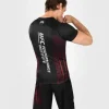 Man wearing Venum x UFC Performance Institute 2.0 Men's Short Sleeve Rashguard