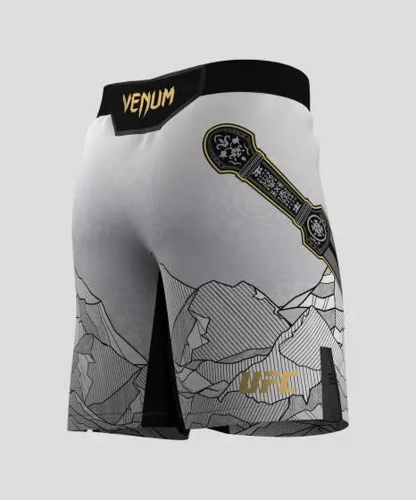 Official Islam Makhachev Unrivaled Fightshorts by Venum x UFC. Venum x UFC Unrivaled Islam Makhachev Fightshorts on a white background.