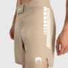 A robust man wearing Venum Tempest Men's Fightshorts