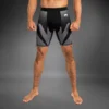 Man wearing Venum Attack Men's Vale Tudo Shorts
