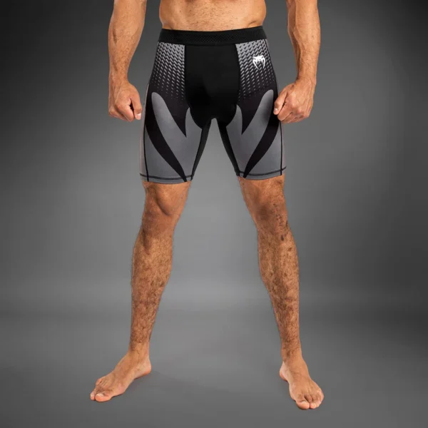Man wearing Venum Attack Men's Vale Tudo Shorts