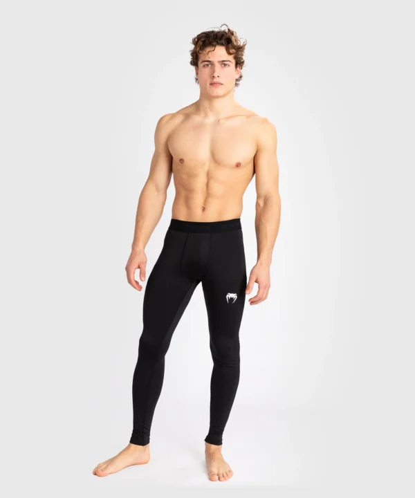 Venum Contender Men's Spats Compression Tights Lifestyle Shot Man wearing Venum Contender Men's Spats Compression Tights