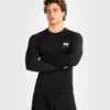 Venum Contender Men's Long Sleeve Rash Guard Man wearing Venum Contender long sleeve rash guard