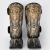 Venum Tiger Shin Guards on white background