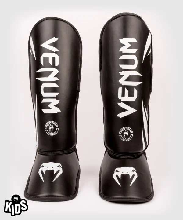 Young athlete wearing Venum Kids Challenger Shin Guards