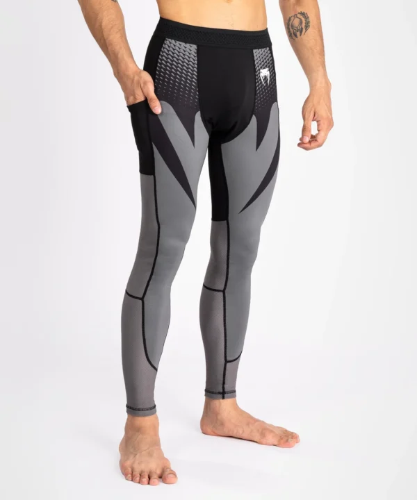 Man wearing Venum Attack Men's Spats Compression Tights