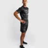 Athlete in Action Wearing Venum G-Fit T-Shirt A man wearing the Venum G-Fit Air Dry Tech T-Shirt