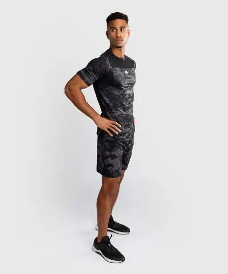 Athlete in Action Wearing Venum G-Fit T-Shirt A man wearing the Venum G-Fit Air Dry Tech T-Shirt