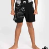 Venum Gorilla Jungle Kids Fightshorts Image Kid wearing Venum Gorilla Jungle Kids Fightshorts