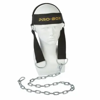 Man wearing a Pro-Box Head Neck Strength Harness for intense training.