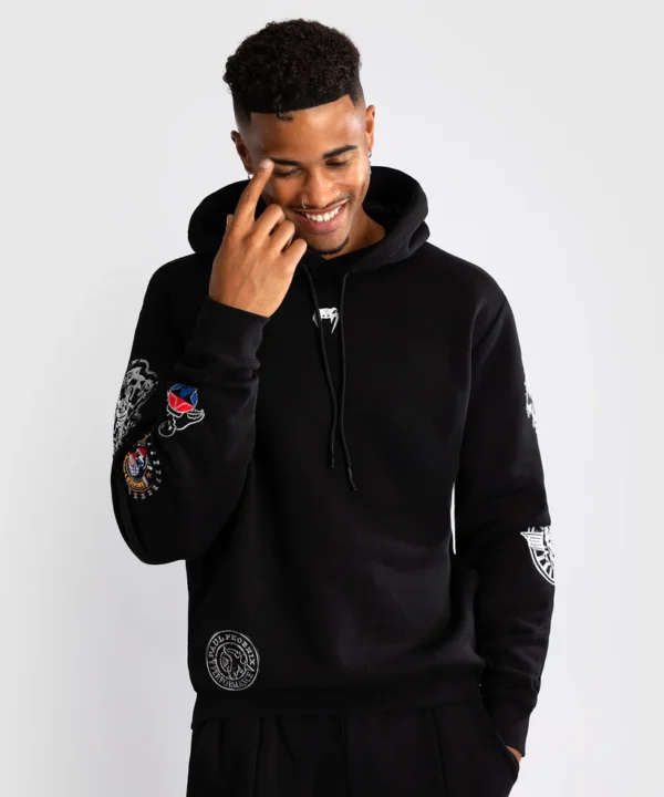 Venum x Tekken 8 Paul Phoenix Hoodie Product Image. Venum x Tekken 8 Paul Phoenix Hoodie in a studio setting.