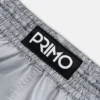 Pair of Primo Muay Thai Shorts Alta Series in a professional setting