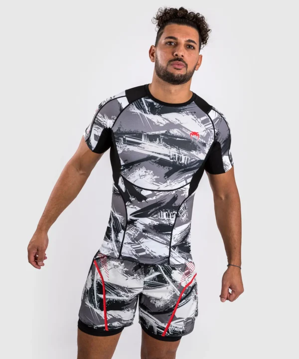 Venum Electron 3.0 Short Sleeve Rashguard Venum Electron 3.0 Short Sleeve Rashguard in vibrant red and black color scheme