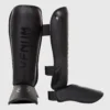 Venum Challenger Standup Shin Guards in combat sports setting